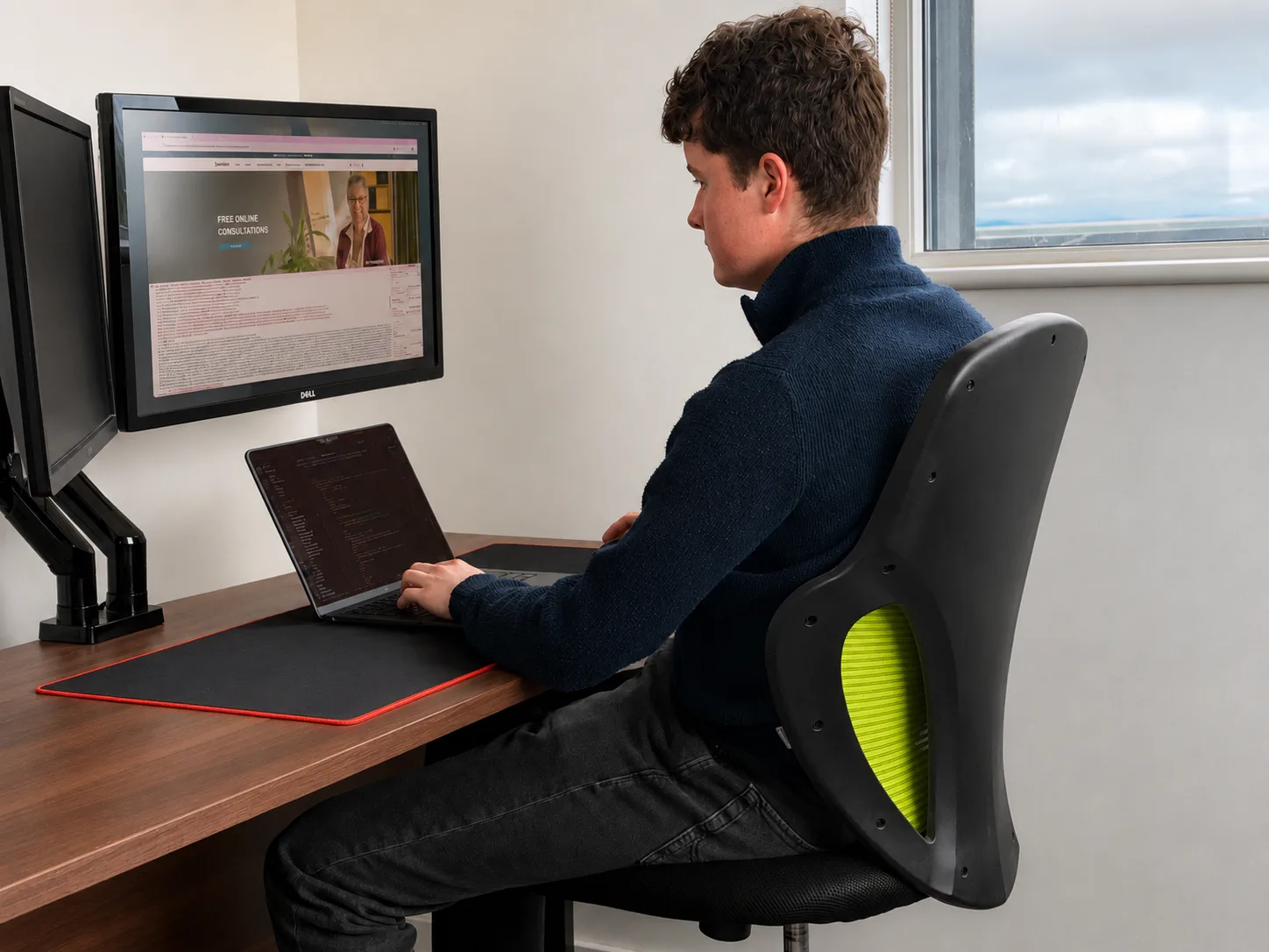 Eoghan Collins at his desk, tearing down a Shopify store's support setup